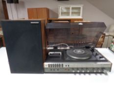 A retro National Panasonic stereo with speakers