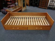 A continental teak day bed