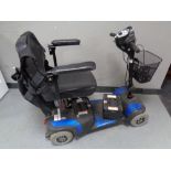 A Mercury mobility cart with charger and extra battery