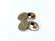 A pair of 9ct gold and enamelled cuff links CONDITION REPORT: 11.