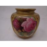 A Royal Worcester hand painted gilded vase decorated with pink roses, height 8.5 cm.