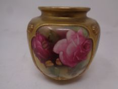 A Royal Worcester hand painted gilded vase decorated with pink roses, height 8.5 cm.