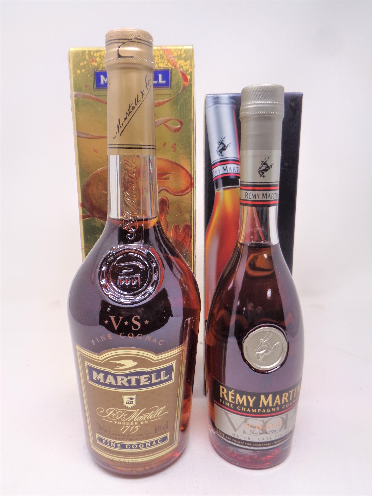 A boxed bottle of Remy Martin mature cask finish fine champagne cognac (35cl) together with a