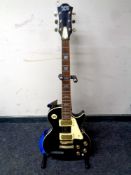 A Rockwood by Hohner Pro RP200 electric guitar on stand