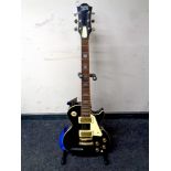 A Rockwood by Hohner Pro RP200 electric guitar on stand