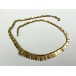 A 9ct gold fringed necklace CONDITION REPORT: 7.