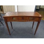 A Regency style inlaid mahogany inverted bow front side table fitted two drawers