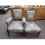 A Victorian mahogany lady's and gent's chair upholstered in a floral brocade fabric