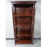 A mahogany effect open book case