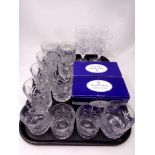 A tray containing boxed set of four Royal Doulton crystal whisky tumblers,
