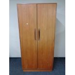 A 20th century teak G plan double door wardrobe