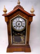 An antique American eight day striking clock by Jerome & Co.
