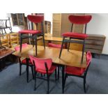 A mid 20th century walnut veneered dining room suite comprising of drop leaf dining table,