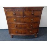 A Victorian mahogany bowfronted chest of five drawers