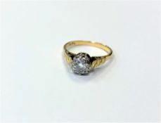 An 18ct gold solitaire diamond ring, the brilliant cut stone weighing approximately 0.