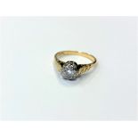 An 18ct gold solitaire diamond ring, the brilliant cut stone weighing approximately 0.