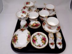 A tray containing a set of six Royal Albert Christmas Magic bone china tea cups and saucers