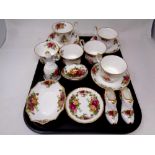 A tray containing a set of six Royal Albert Christmas Magic bone china tea cups and saucers