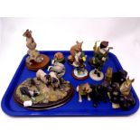 A tray containing twelve assorted animal figures to include Border Fine Arts,