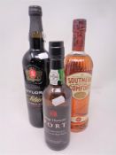 A bottle of Taylors select reserve port (75cl), a further bottle of Southern Comfort (70cl),