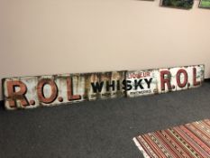 A mid 20th Century enamelled advertising sign : Rare Old Liqueur Whisky - The Newcastle Breweries