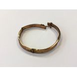 A 9ct gold bangle (damages) CONDITION REPORT: 8.