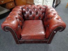 A Chesterfield oxblood buttoned leather club armchair (as found)