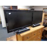 A Toshiba 22" LCD TV DVD with remote together with a further LCD 22" TV with remote