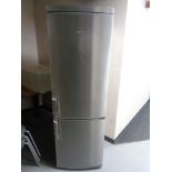 An AEG Santo frost free upright fridge freezer in a stainless steel finish, height 184 cm.