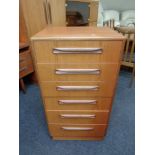 A 20th century teak G plan narrow six drawer chest