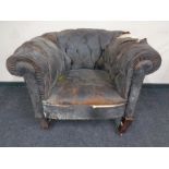 A 19th century leather upholstered club armchair (as found)