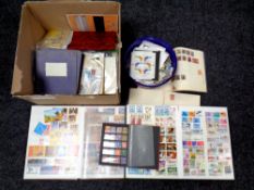A box containing thousands of 20th century world stamps,