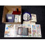 A box containing thousands of 20th century world stamps,