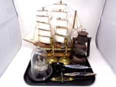 A tray containing antique oil lamp, three diecast models of a spitfire, the Bismarck and HMS Hood,