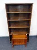 A set of oak open bookshelves together with a contemporary magazine rack with lion mask handles