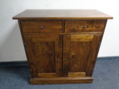 A contemporary side cabinet fitted cupboards and drawers