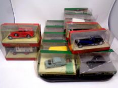 A tray containing twelve Corgi Classics die cast models together with four further Matchbox Models