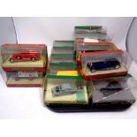 A tray containing twelve Corgi Classics die cast models together with four further Matchbox Models