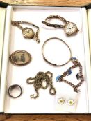 A small quantity of antique and later jewellery comprising gold plated charm bracelet with silver