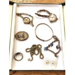 A small quantity of antique and later jewellery comprising gold plated charm bracelet with silver