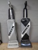 An Oreck classic XL upright vacuum together with a further Oreck XL 5 upright vacuum