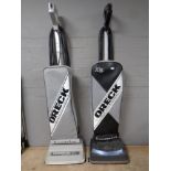 An Oreck classic XL upright vacuum together with a further Oreck XL 5 upright vacuum