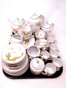 A large Japanese eggshell tea service of dragon design