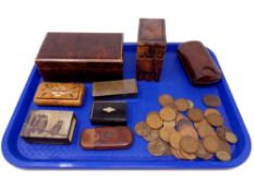 A tray containing antique match vestas, pill boxes, British pennies,