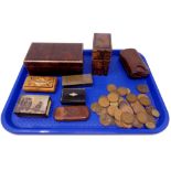 A tray containing antique match vestas, pill boxes, British pennies,