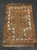 An Afghan prayer rug 89 cm x 130 cm