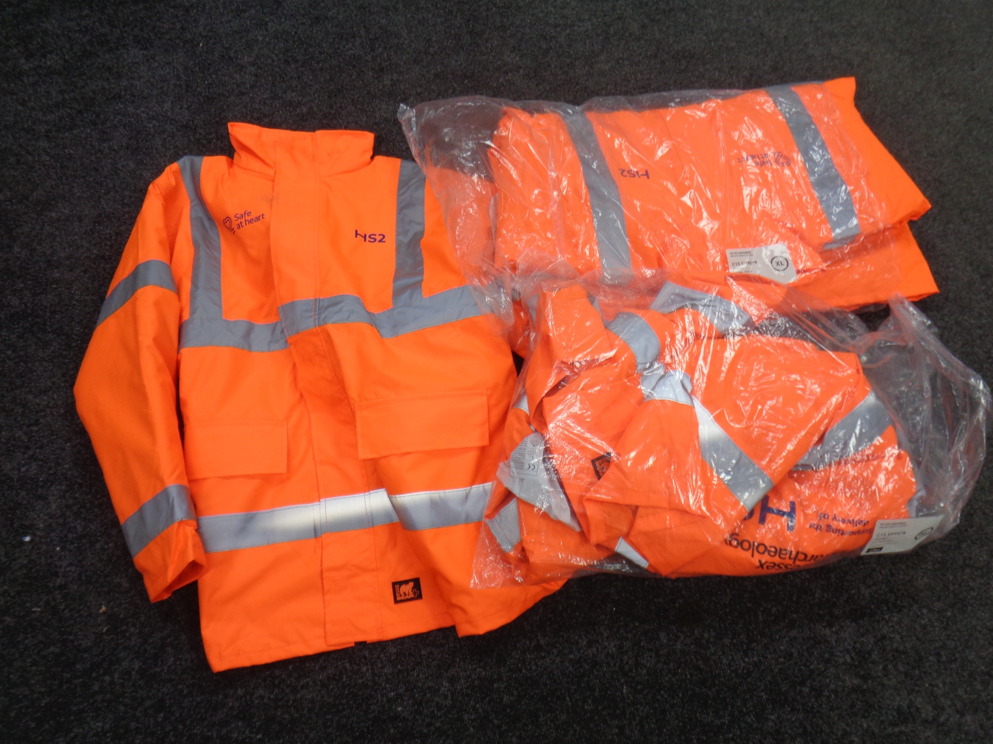 Three high visibility jackets