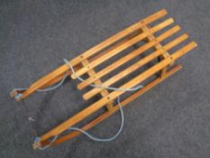 A vintage Davos wooden sledge