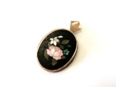 An antique gold pietra dura brooch with portrait to reverse