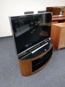 A Panasonic 47" LCD TV on contemporary oval television stand